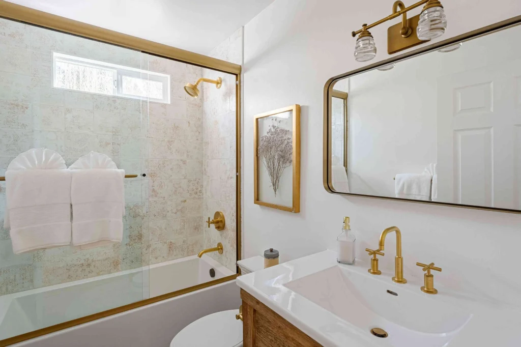 Certified and insured renovation expert from Bathroom RenovationsWest Auckland on-site with a client.